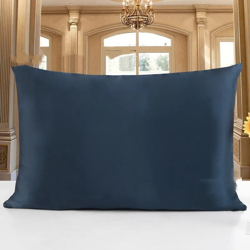 Double-sided 19 M silk pillowcase in apricot colour, showing smooth satin weave texture.
