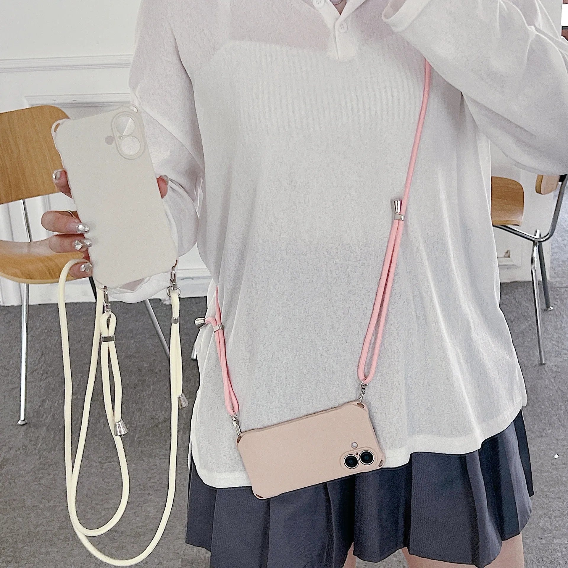 Four-corner cross lanyard liquid silicone phone case for Apple iPhone 16 in antique white with matching lanyard