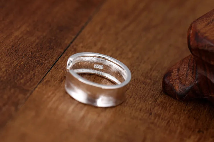 Adjustable geometric open ring with a Korean frosted sterling silver finish.