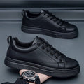 Men's low-top Korean-style casual sneakers in all black colour with a rubber sole.