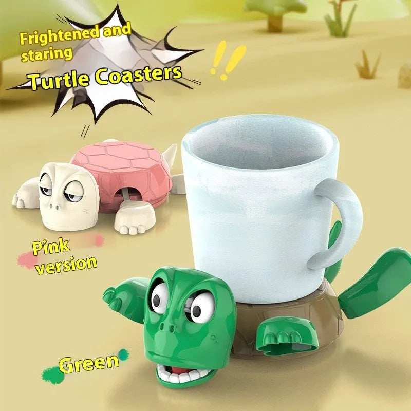 Turtle-shaped drink coaster made from ABS plastic in a light green colour on a wooden table.