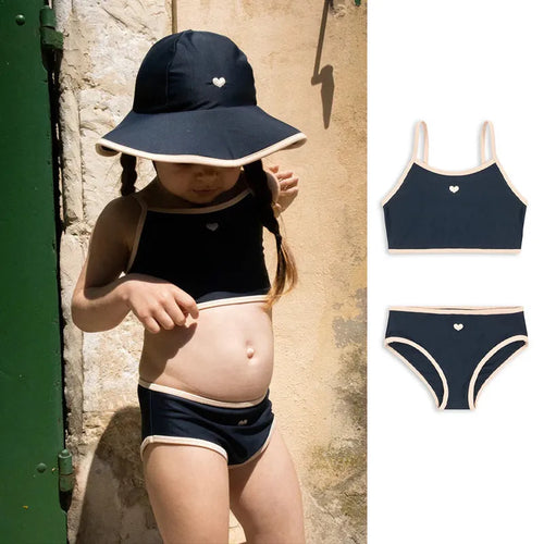 Dark blue baby girl swimsuit in polyester with Lycra lining for swimming activities