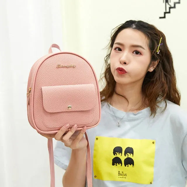 Women small solid colour PU backpack with zip closure for mobile phone and student travel use