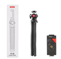 Black octopus leg mobile phone tripod with clip, extended to 360mm on a table.