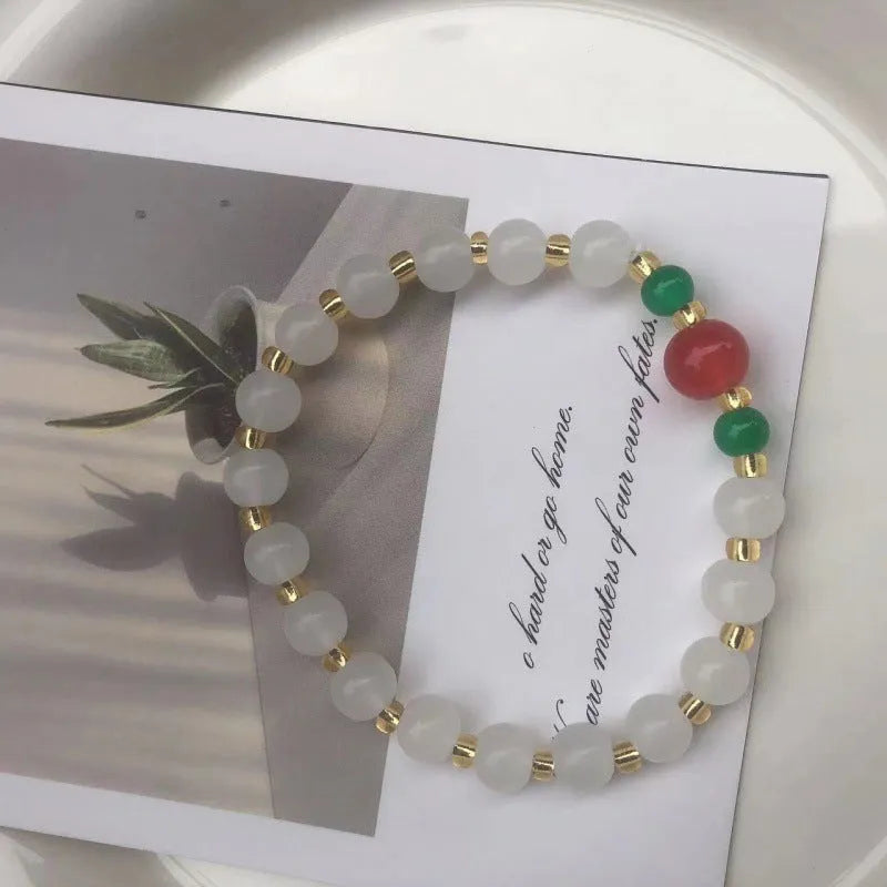 Chinese style bamboo leaf glass bracelet for women with a bamboo joint design.