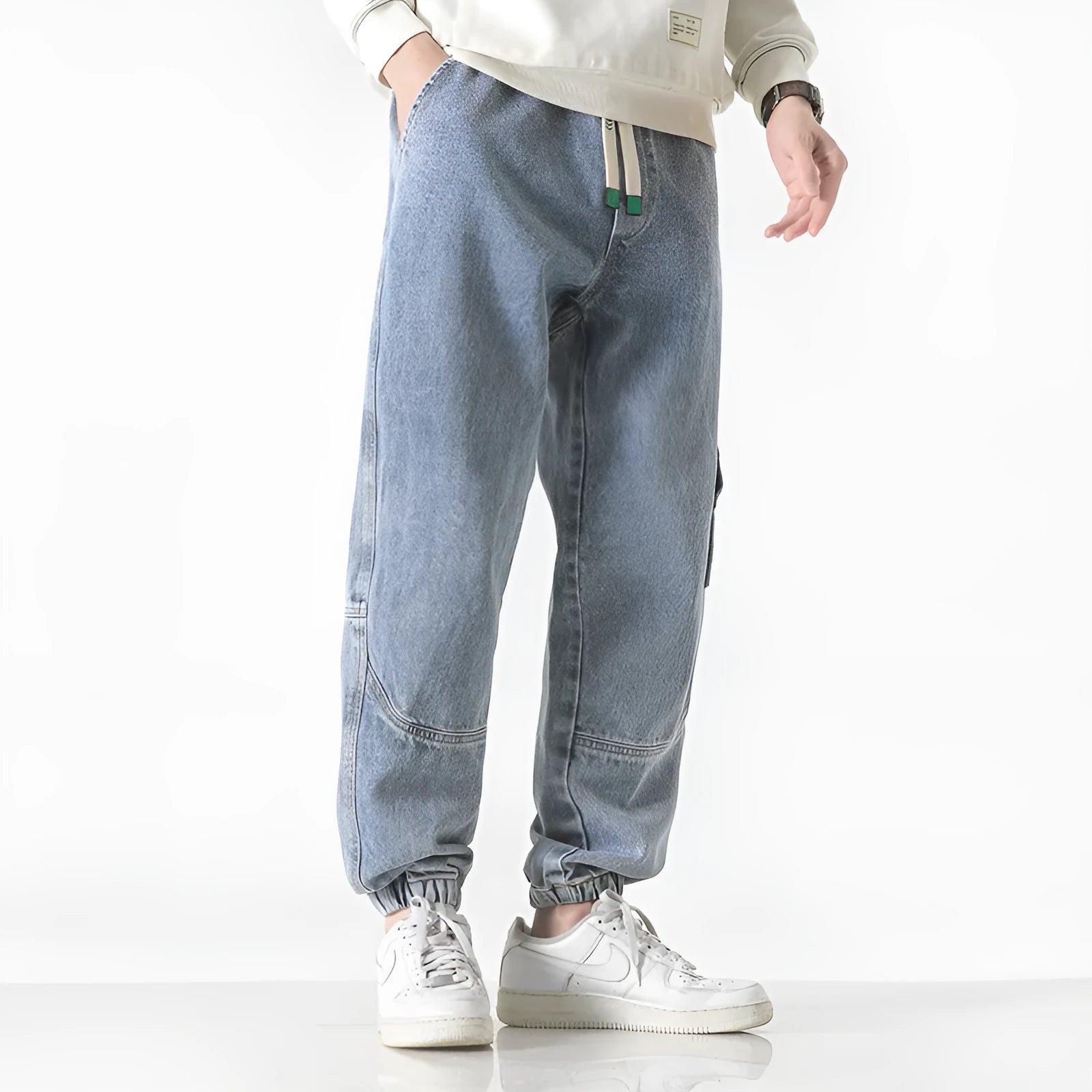 Men's cotton loose-fit tapered trousers in black, blue, and grey colours