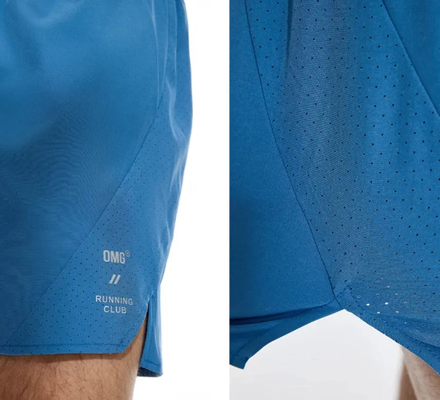 Black and blue four-point stretch running shorts with laser-stitched seams laid flat.