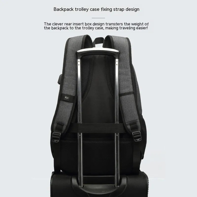 Grey nylon backpack with USB charging port showing dimensions and trolley straps