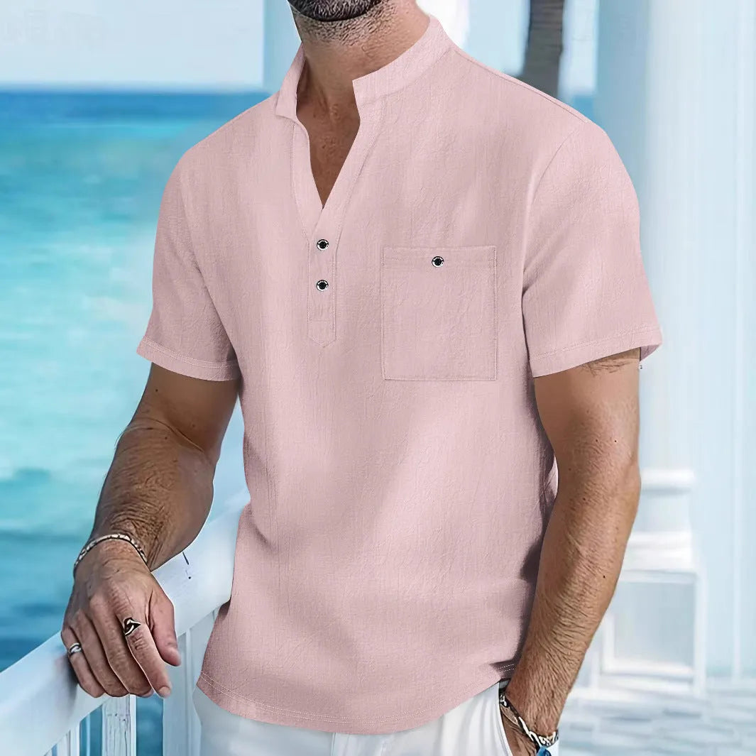 Men's light blue linen stand collar short sleeve shirt laid flat showing loose fit