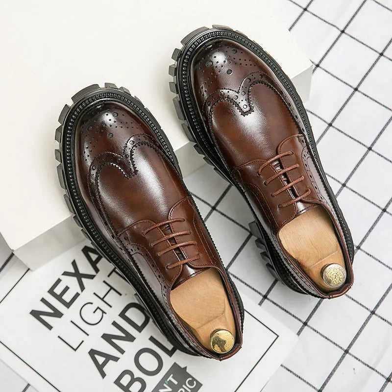 Men's black brogue leather shoes with round toe and traditional brogue detailing