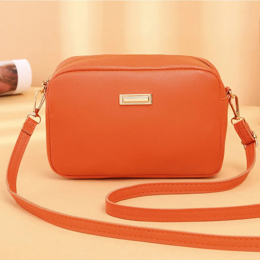 Women's solid colour PU shoulder bag with three-dimensional pockets in horizontal square shape