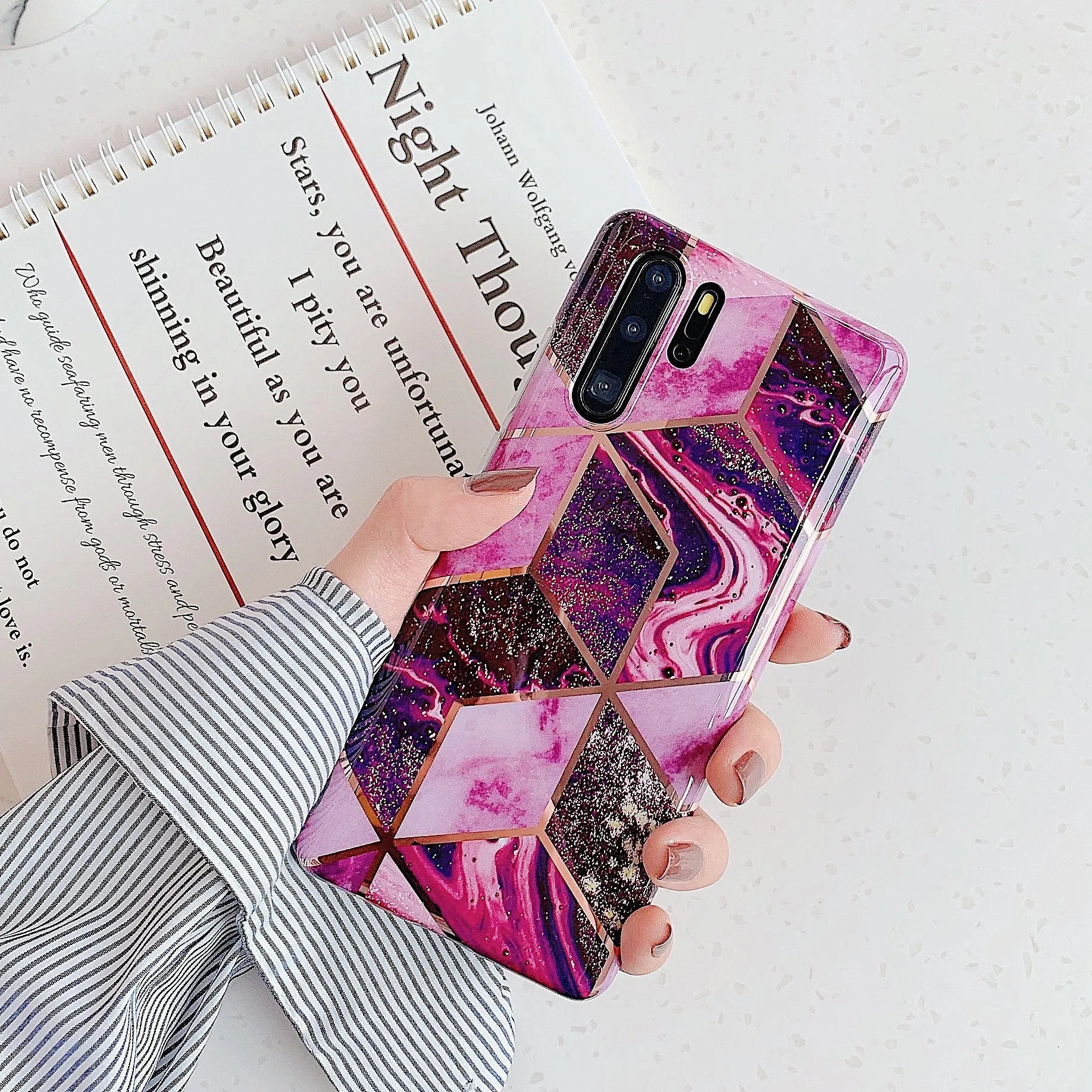 Electroplated marble pattern TPU phone case for Huawei and Samsung smartphones in various colours.