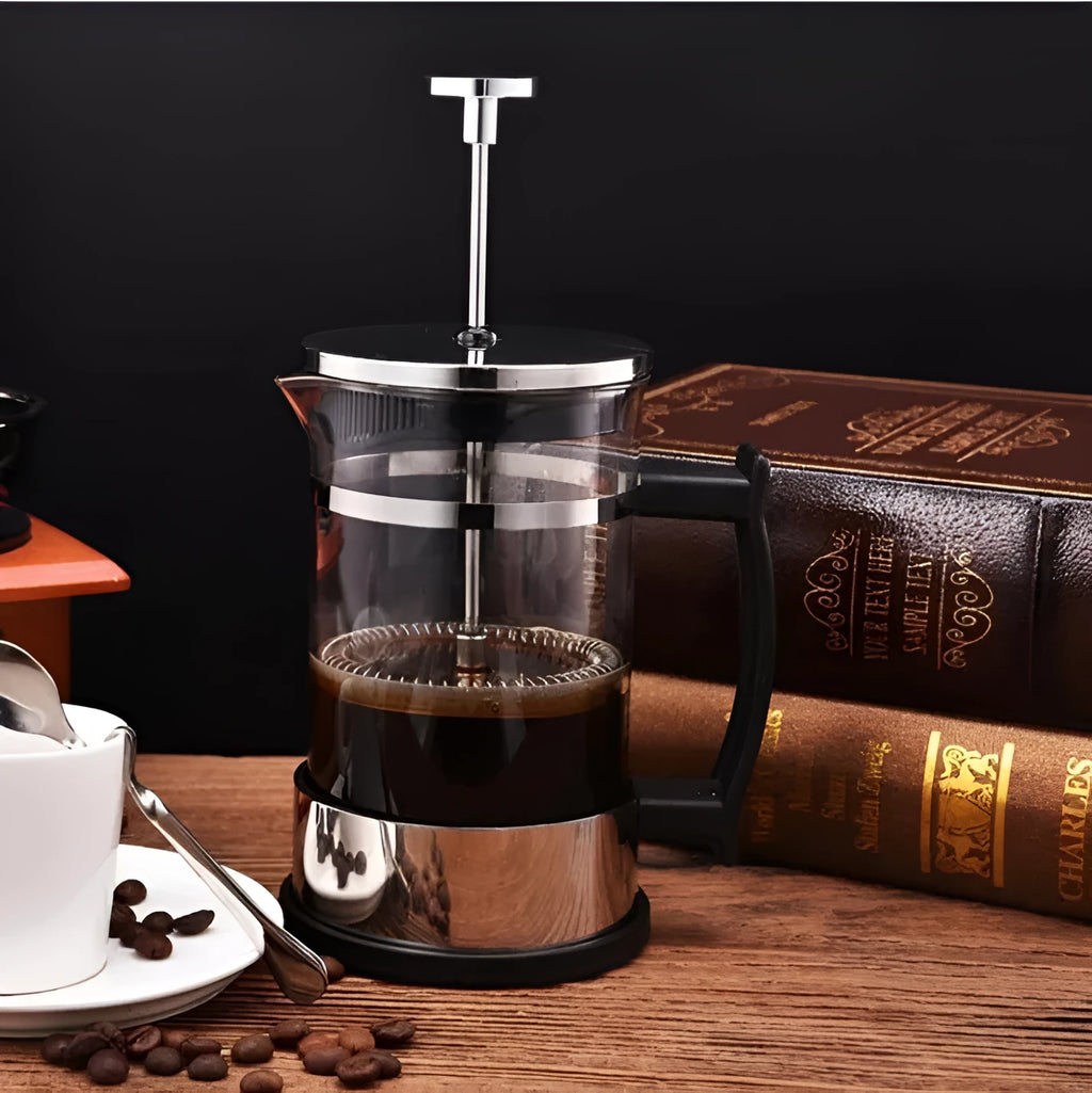 Compact glass and stainless steel coffee maker with 350ml capacity and pour-over design