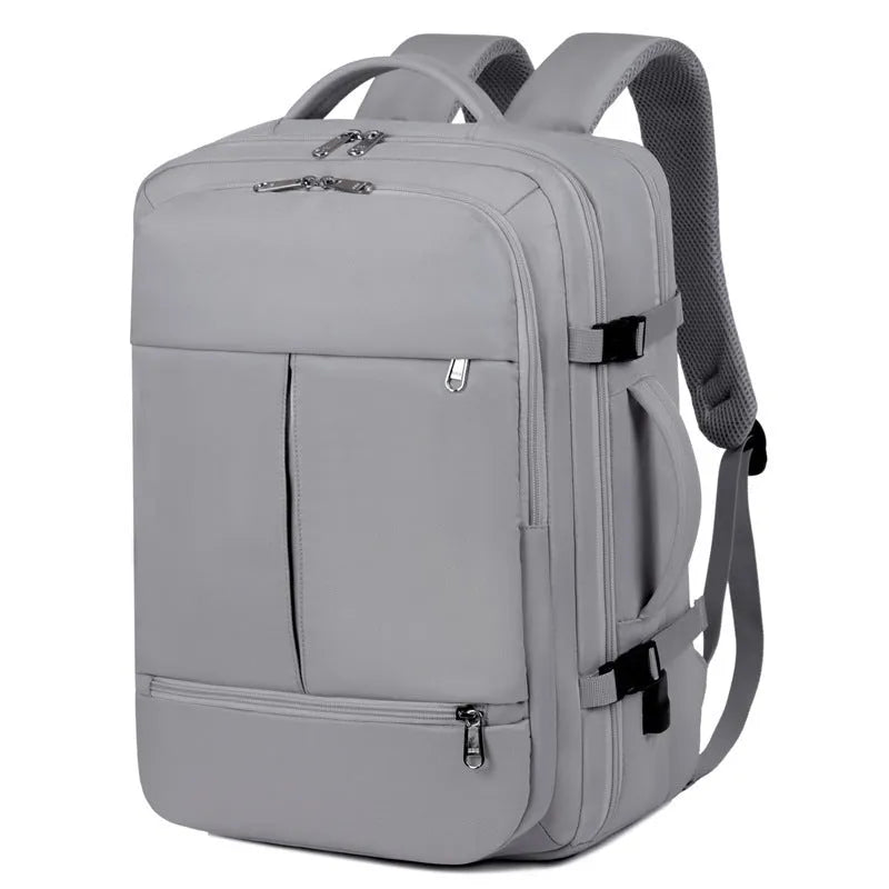 Waterproof oxford cloth backpack showing multiple pockets and zippers with 15.6 inch laptop compartment