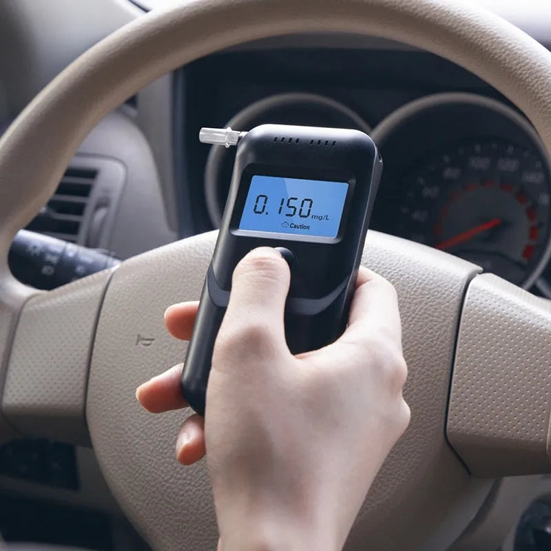 Black household alcohol tester breathalyzer device for drunk driving detection