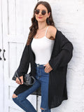 Women's loose acrylic sweater coat in army green colour showing front view