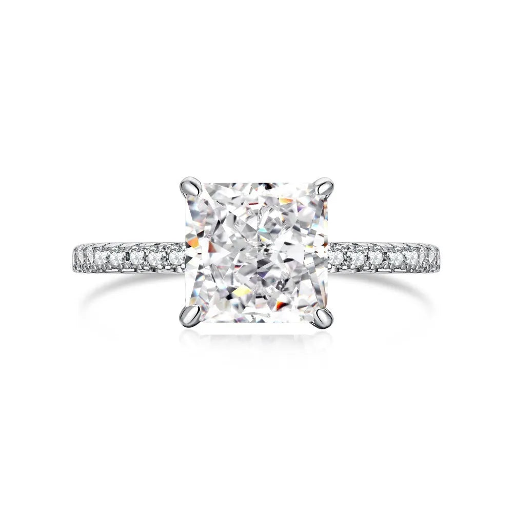 Sterling silver geometric cube sugar ring with ice flower cut cubic zirconia on silver background