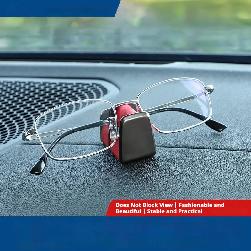 Compact zinc alloy and leather glasses clip for car dashboard, shown in available colours.