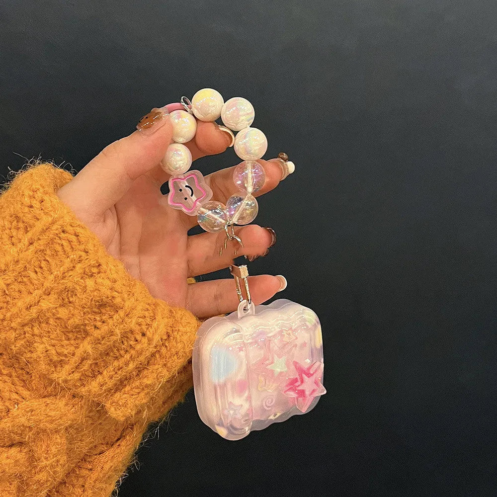 Pink transparent silicone AirPods case with gradual change star pattern and star hand rope