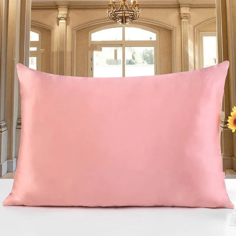 Double-sided 19 M silk pillowcase in apricot colour, showing smooth satin weave texture.