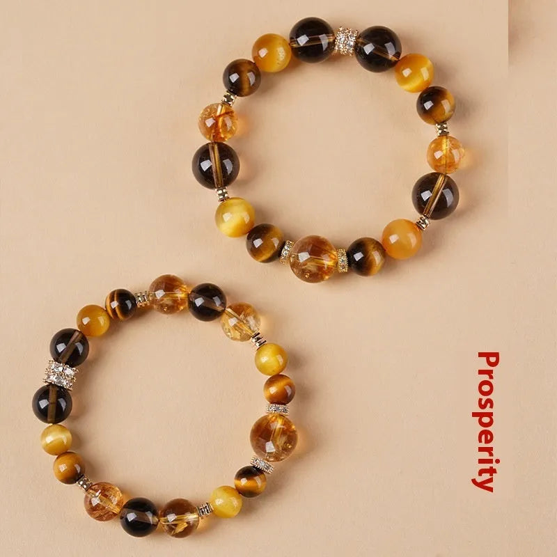 Unisex tiger-eye crystal bracelet with geometric yellow tower beads in 10mm or 12mm size options.