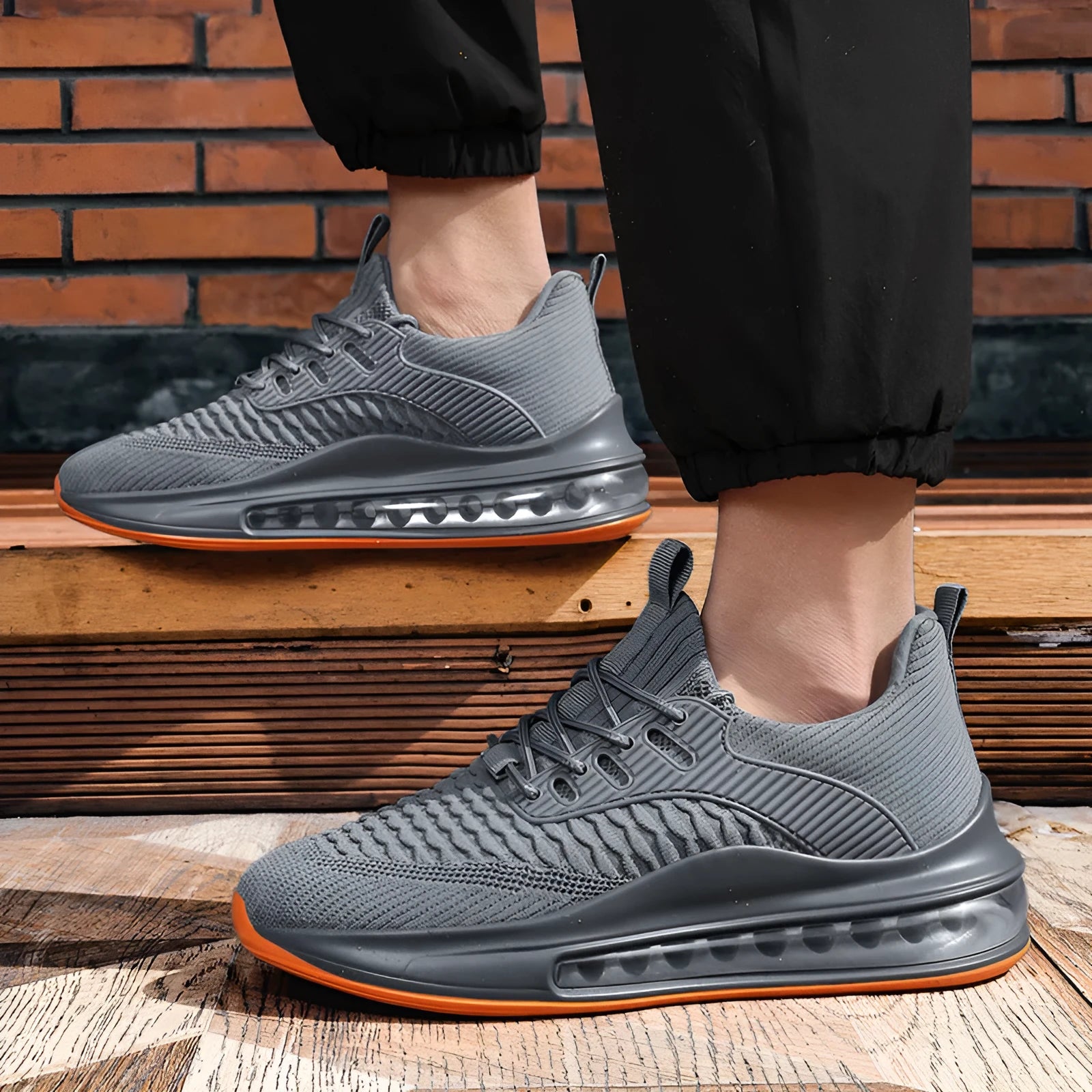 Men's solid colour mesh running sneakers with a round toe and lace-up front on a rubber sole.