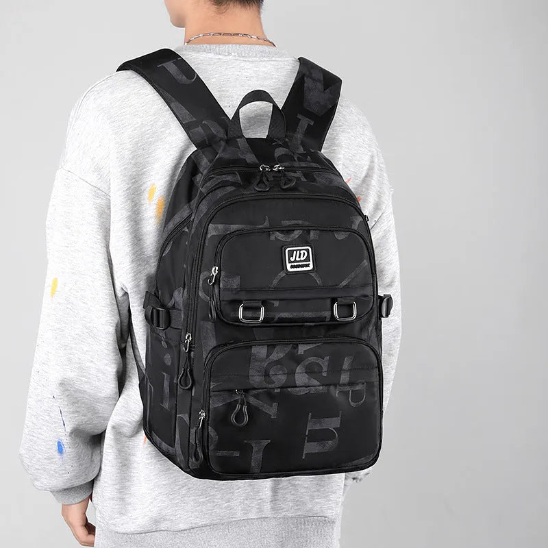 Large capacity nylon school backpack for girls in a choice of colours and patterns, showing ergonomic backplate.