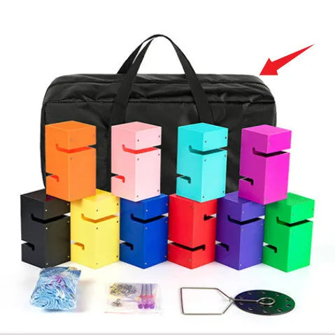 Set of coloured ABS plastic blocks, ropes, and a frame for outdoor group building games and team challenges.