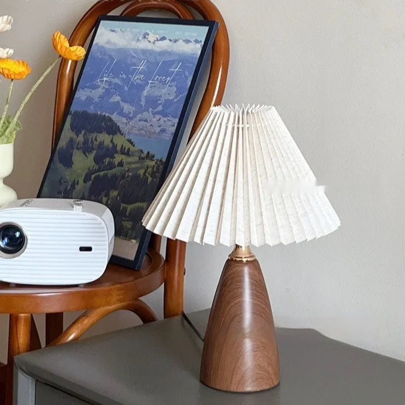 Nordic retro ceramic table lamp with pleated shade on bedside table, remote control included