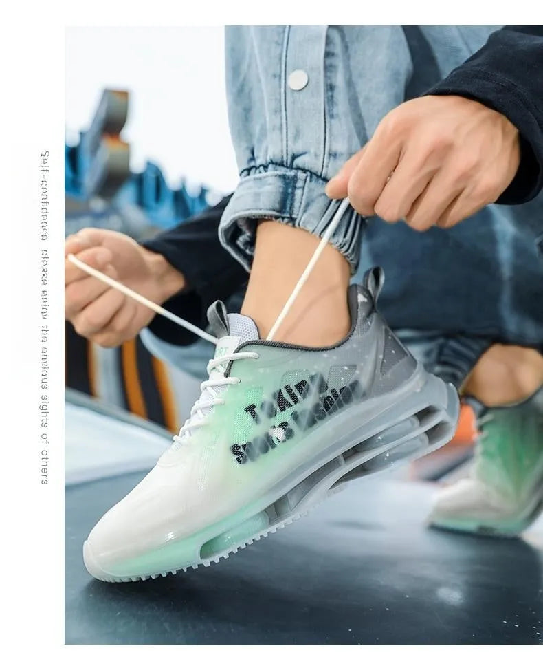 Men's grey and orange platform casual sneakers with mesh upper and lace-up front.