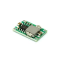 Mini 360 green DC-DC buck converter module measuring 17x11mm with voltage adjustment potentiometer