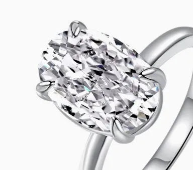 Oval women's ring with four-claw setting in 9 silver, gold and silver colour options