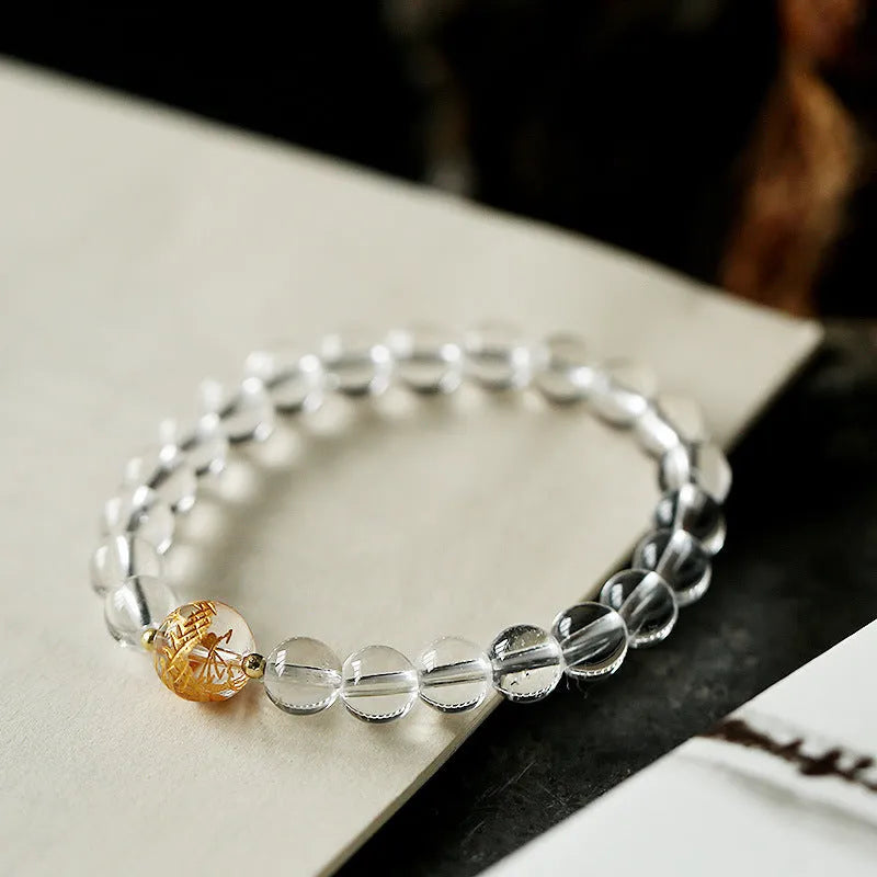 Geometric obsidian and white crystal bracelet with black agate beads and golden dragon centrepiece for 14-16cm wrists