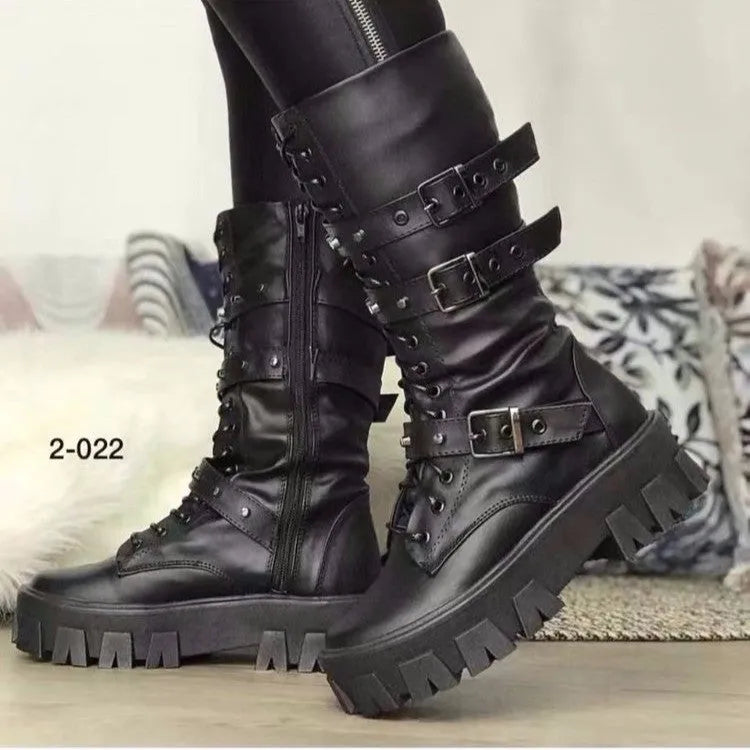 Black women's mid-calf buckle boots with side zip and round toe on a white background.