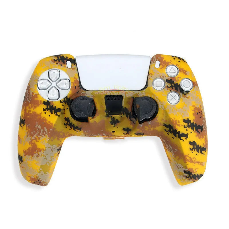 Camouflage silicone case fitted on a PS5 controller handle showing textured surface and snug fit