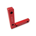 Aluminium woodworking right angle positioning block with scale, shown next to a jigsaw.