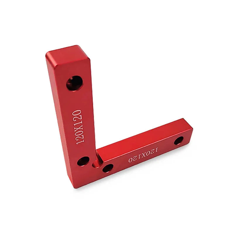 Aluminium woodworking right angle positioning block with scale, shown next to a jigsaw.