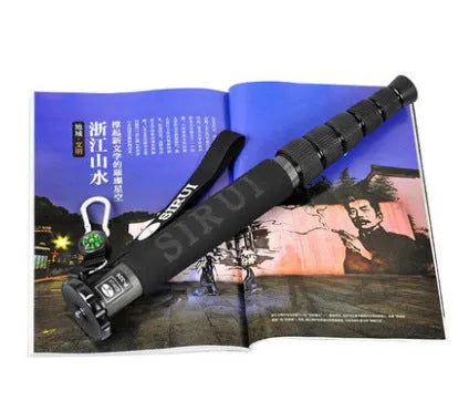 Black carbon fibre SLR camera monopod with six sections extended to maximum 1540mm height