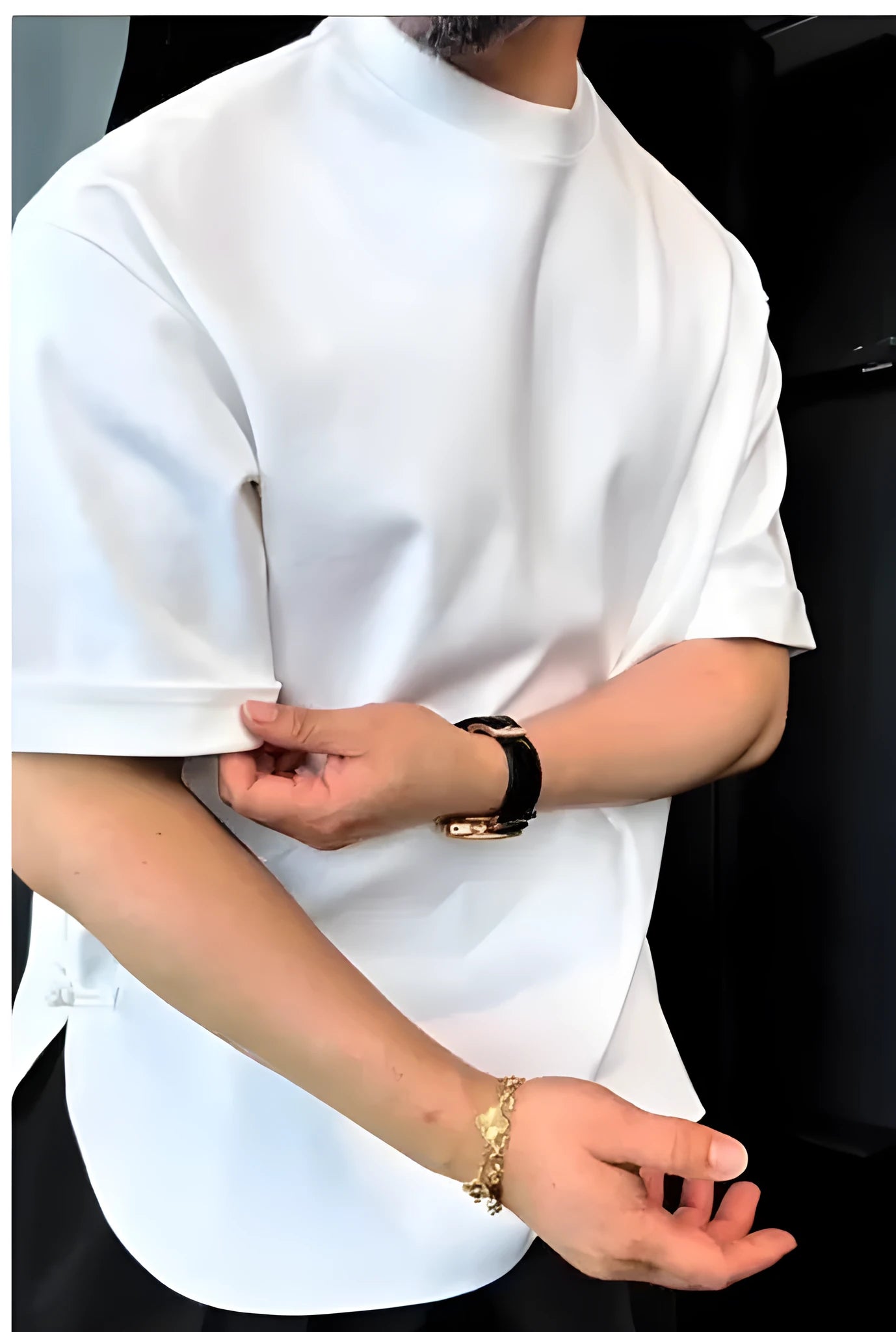 Men's white casual T-shirt with a round hem featuring a button detail, shown in a relaxed fit.