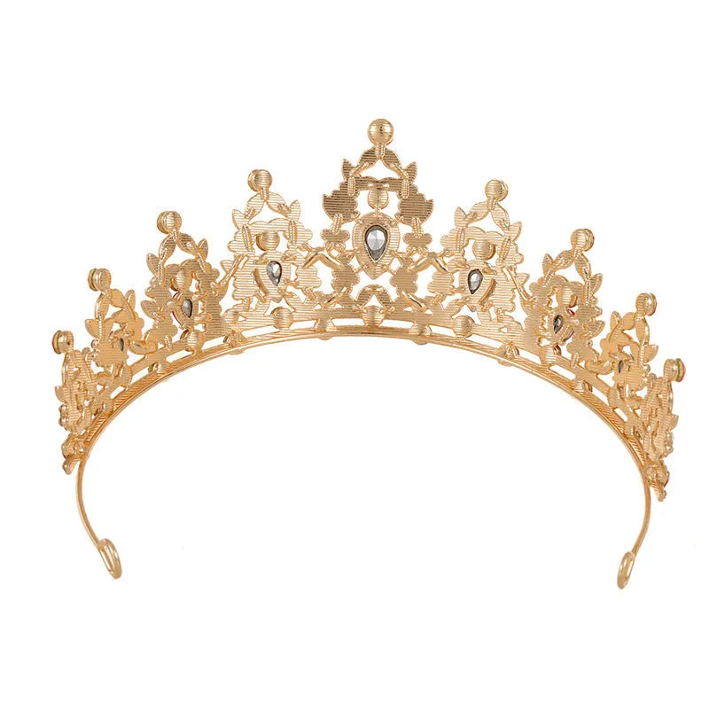 Baroque-style bride crown headdress made of alloy with rhinestone decoration in silver and gold colour options.