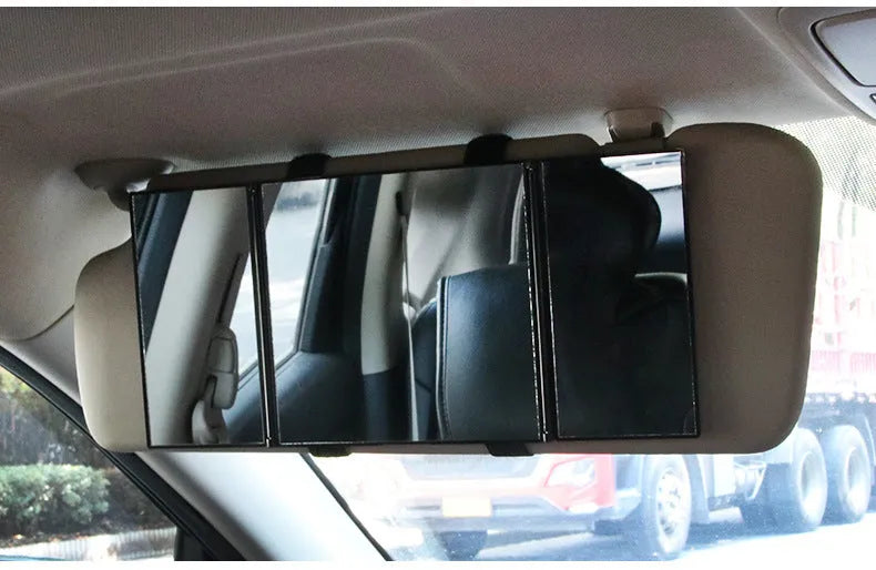 Silver car folding makeup mirror shown closed at 15.5cm width and opened at 30.5cm width