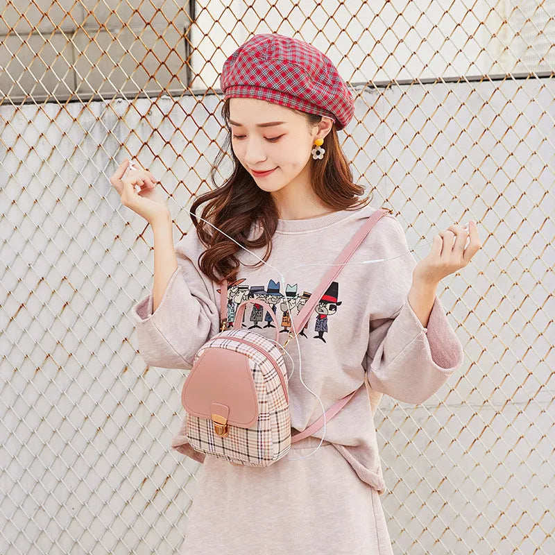 Diagonal one shoulder phone bag in PU fabric available in black, blue, brown, pink, and red colours.