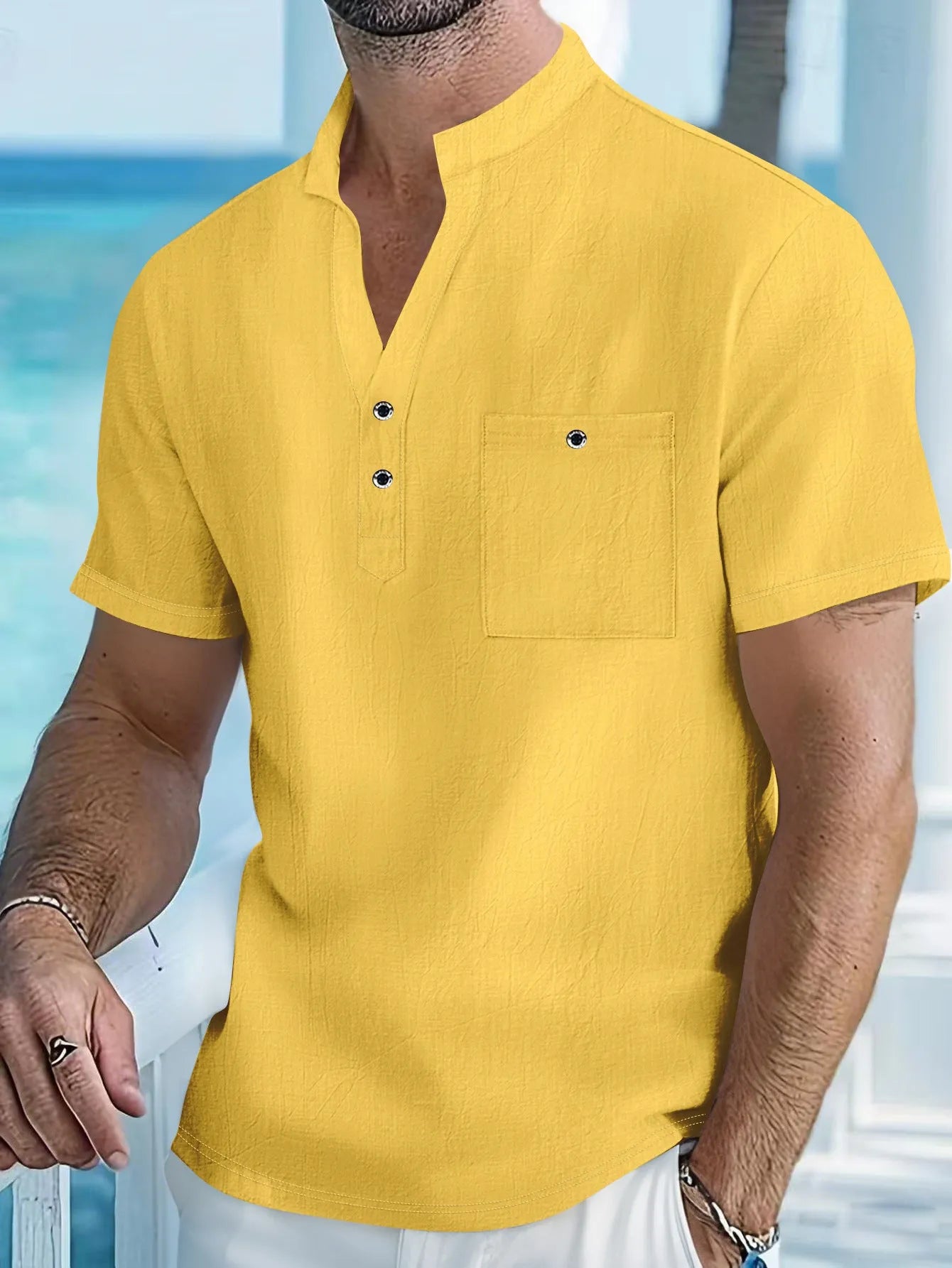 Men's light blue linen stand collar short sleeve shirt laid flat showing loose fit