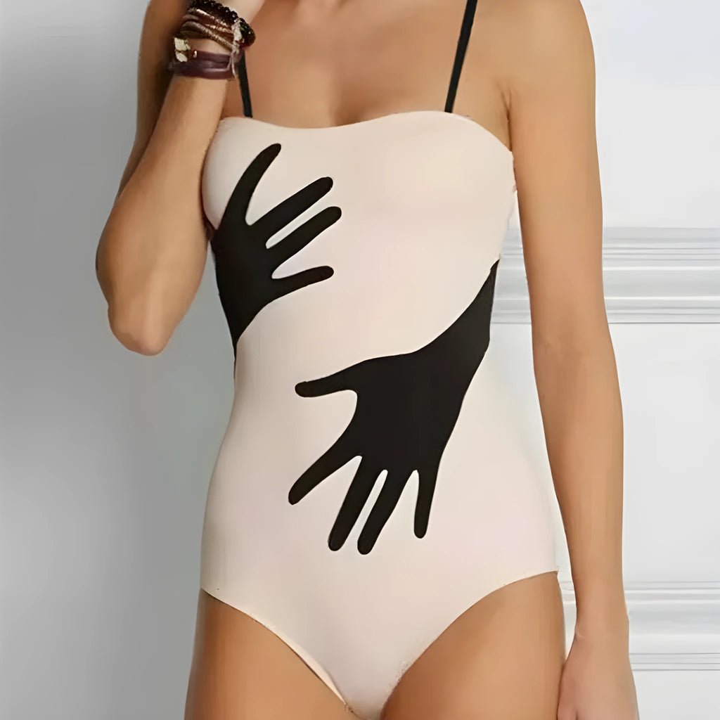 Women's one-piece bikini swimsuit with optional gauze skirt detail in polyester fabric
