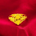 Gold open geometry ring with diamond flower pattern and textured botanical detailing