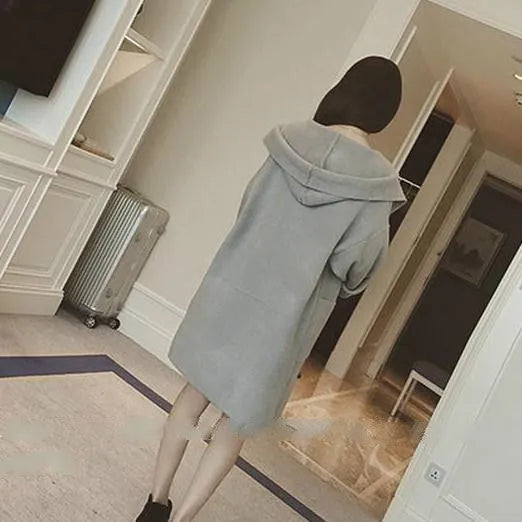 Plus size woman modelling a loose grey lace-trim thin cotton coat for spring and autumn.