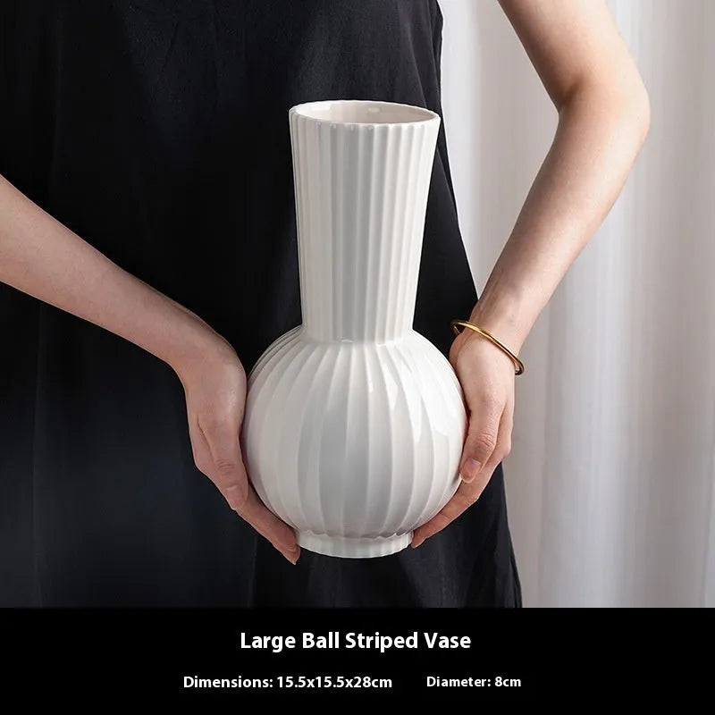 White American country style ball striped ceramic vase with orchid arrangement