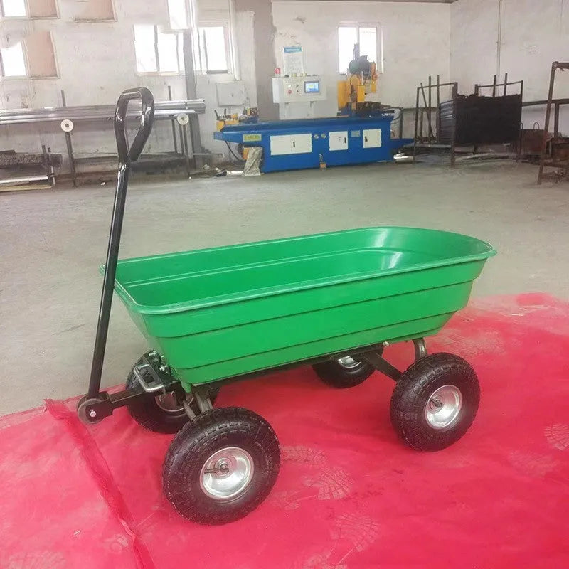 Green four-wheel plastic dumptruck with a large haulage body on a steel-reinforced frame.
