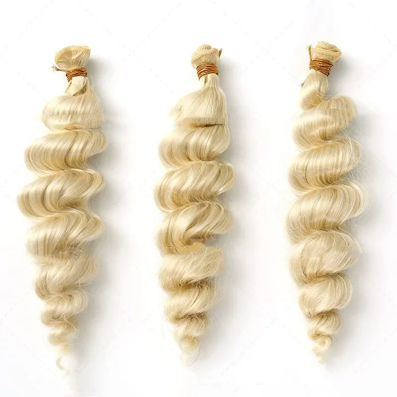 Golden long synthetic wig for women on a stand, showing hair weft construction