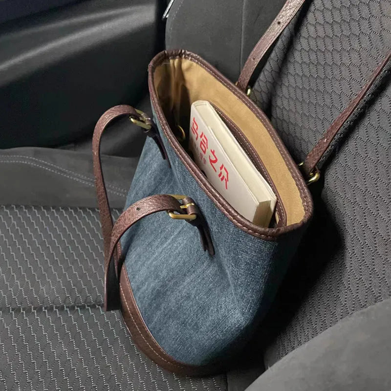 Denim colour patchwork retro bucket handbag with a single shoulder strap.